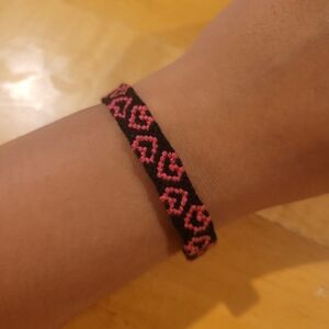 Friendship bracelet with heart design